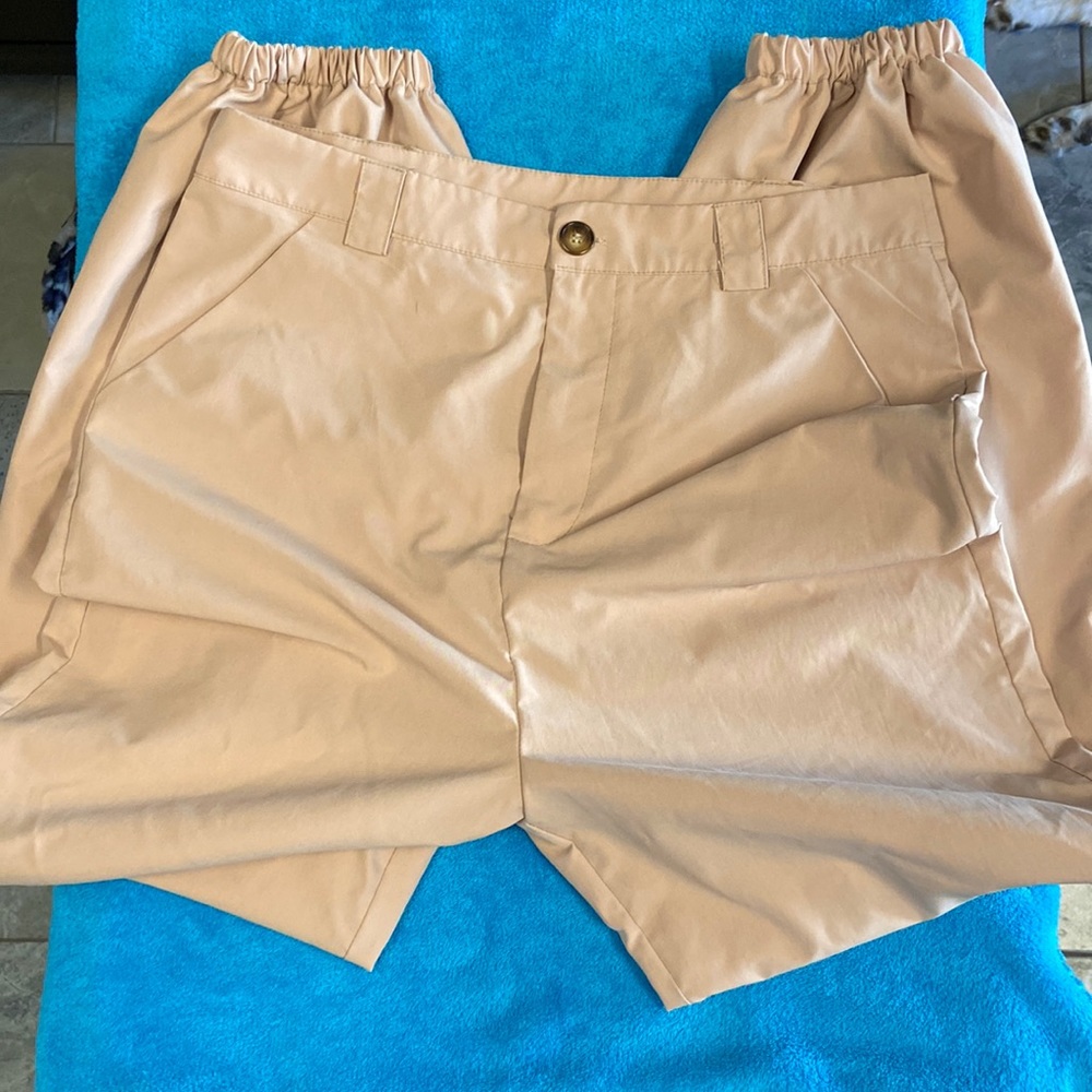 Baggy camel color pants.